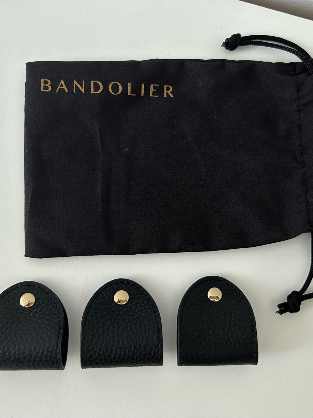 Bandolier Black Leather Cord Organizers with Gold Accents